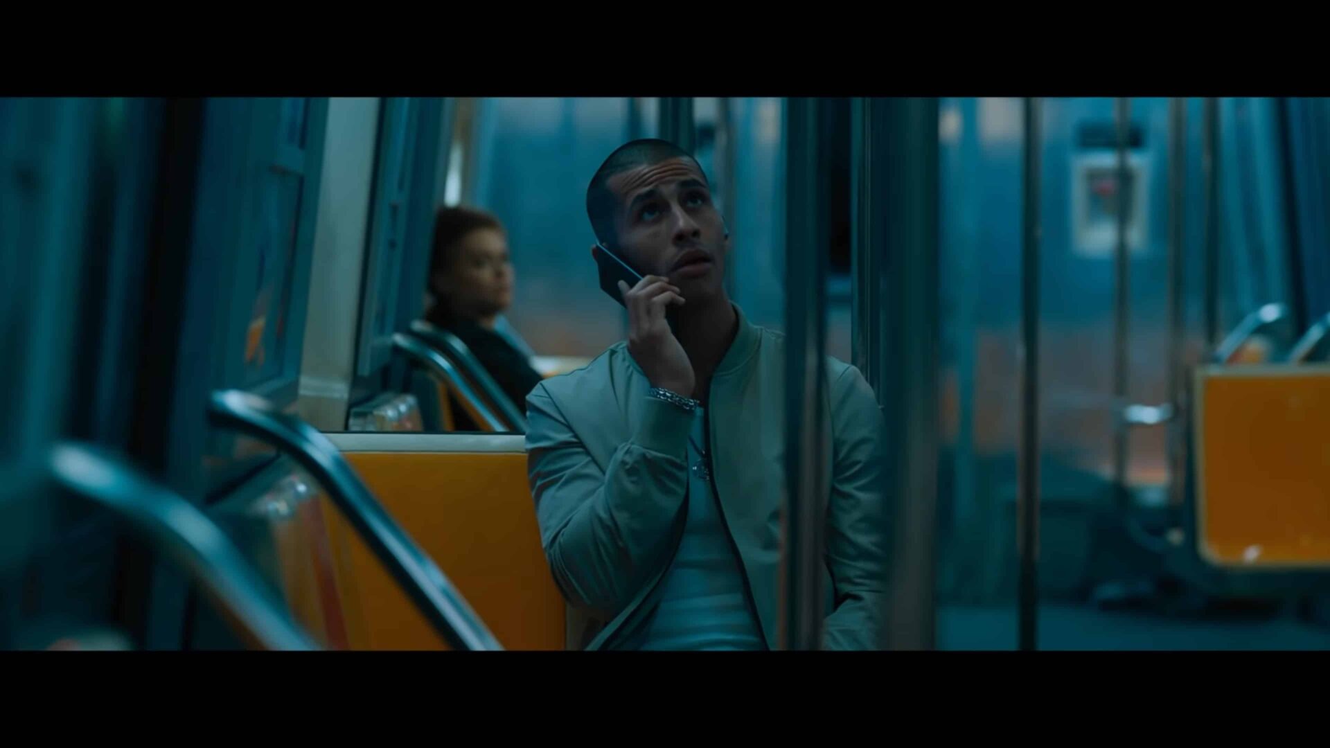 Theo (Carlito Olivero) on the phone with his wife