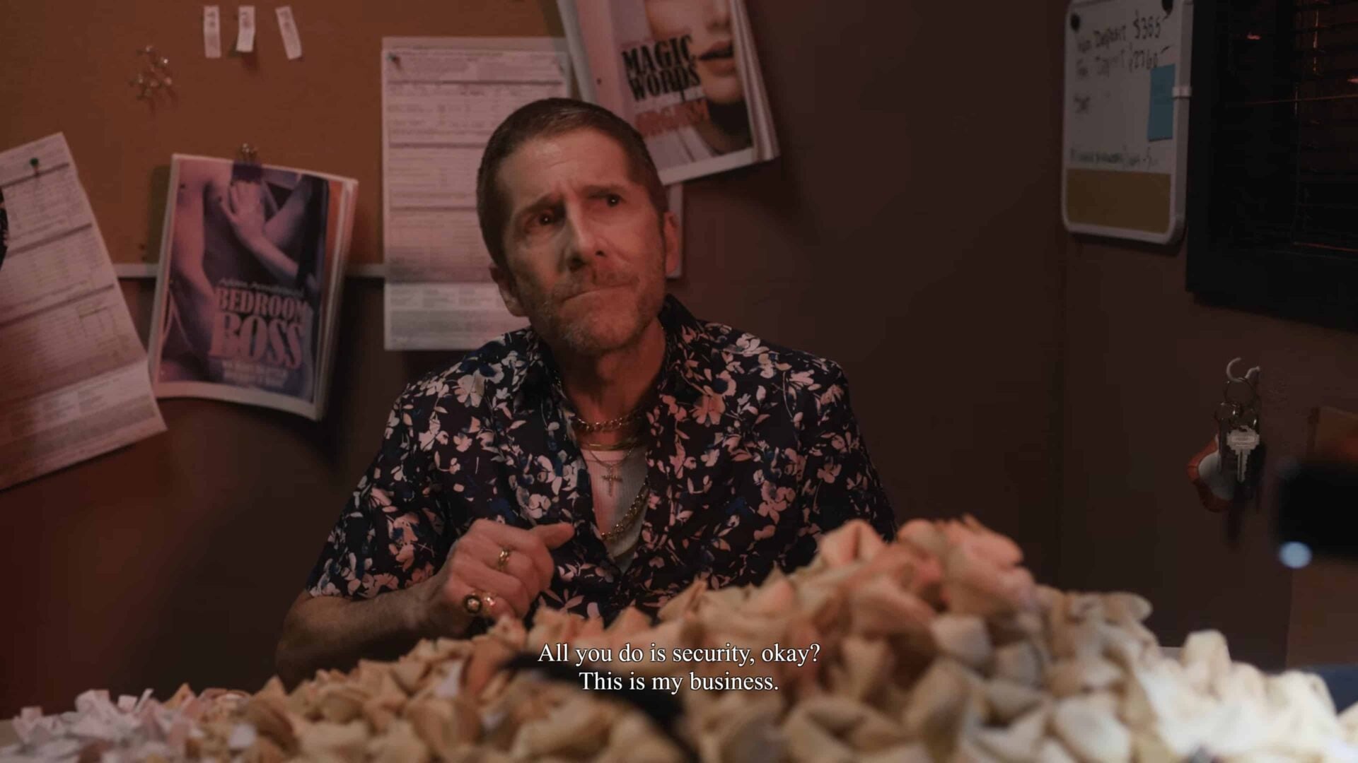 Carl (Leland Orser) making a deal with Trish to provide security for her new venture
