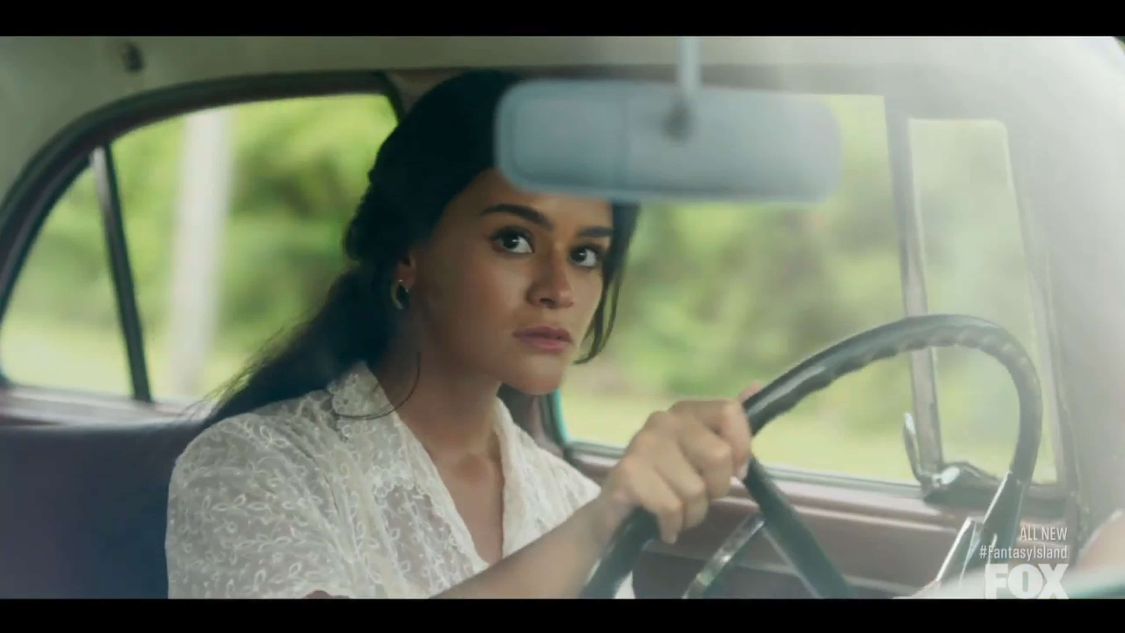 Alma (Gigi Zumbado) driving her grandfather's car in Cuba