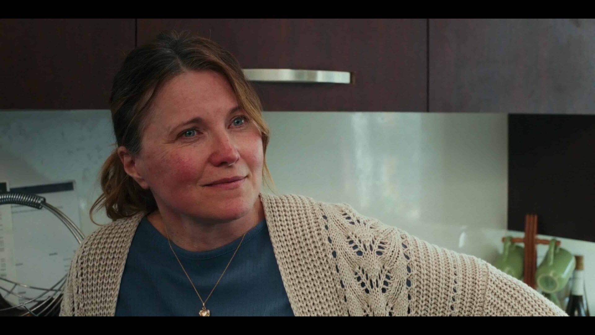 Cheryl (Lucy Lawless) in her kitchen