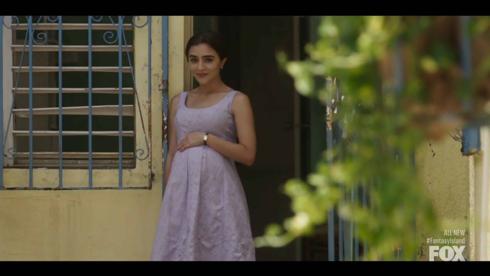 Lily (Liz Dieppa) watching her family