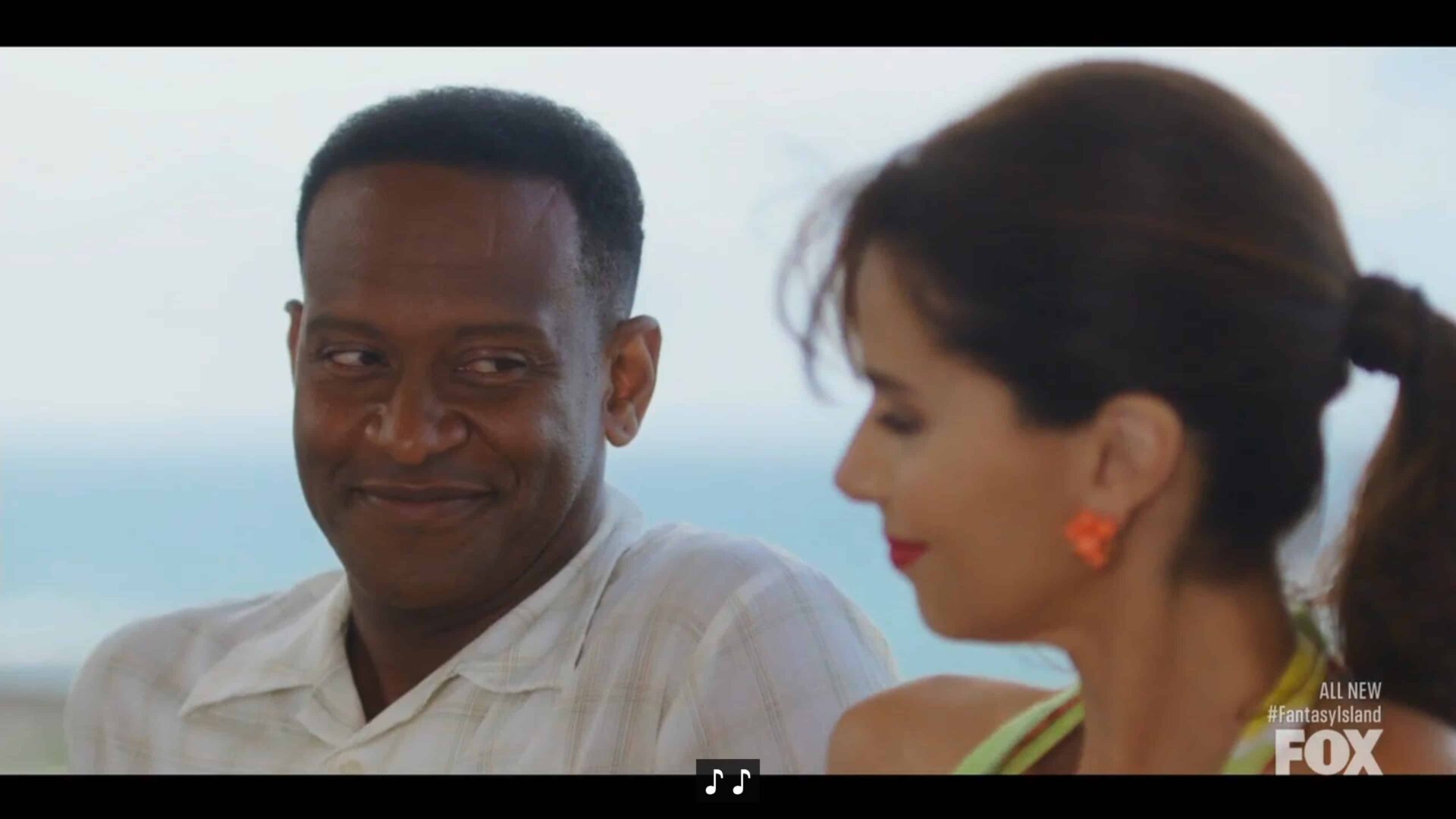 Oscar (Modesto Lacen) smiling at Elena