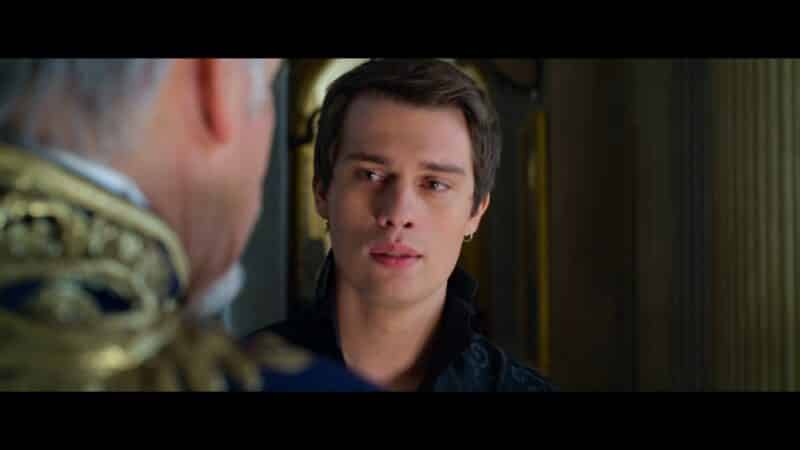 Prince Robert (Nicholas Galitzine) talking to his father