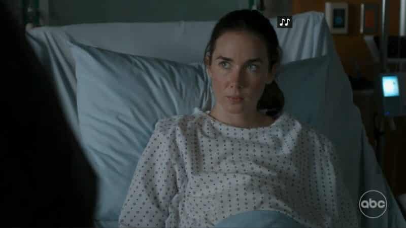 Abby (Lyndon Smith) in a hospital bed