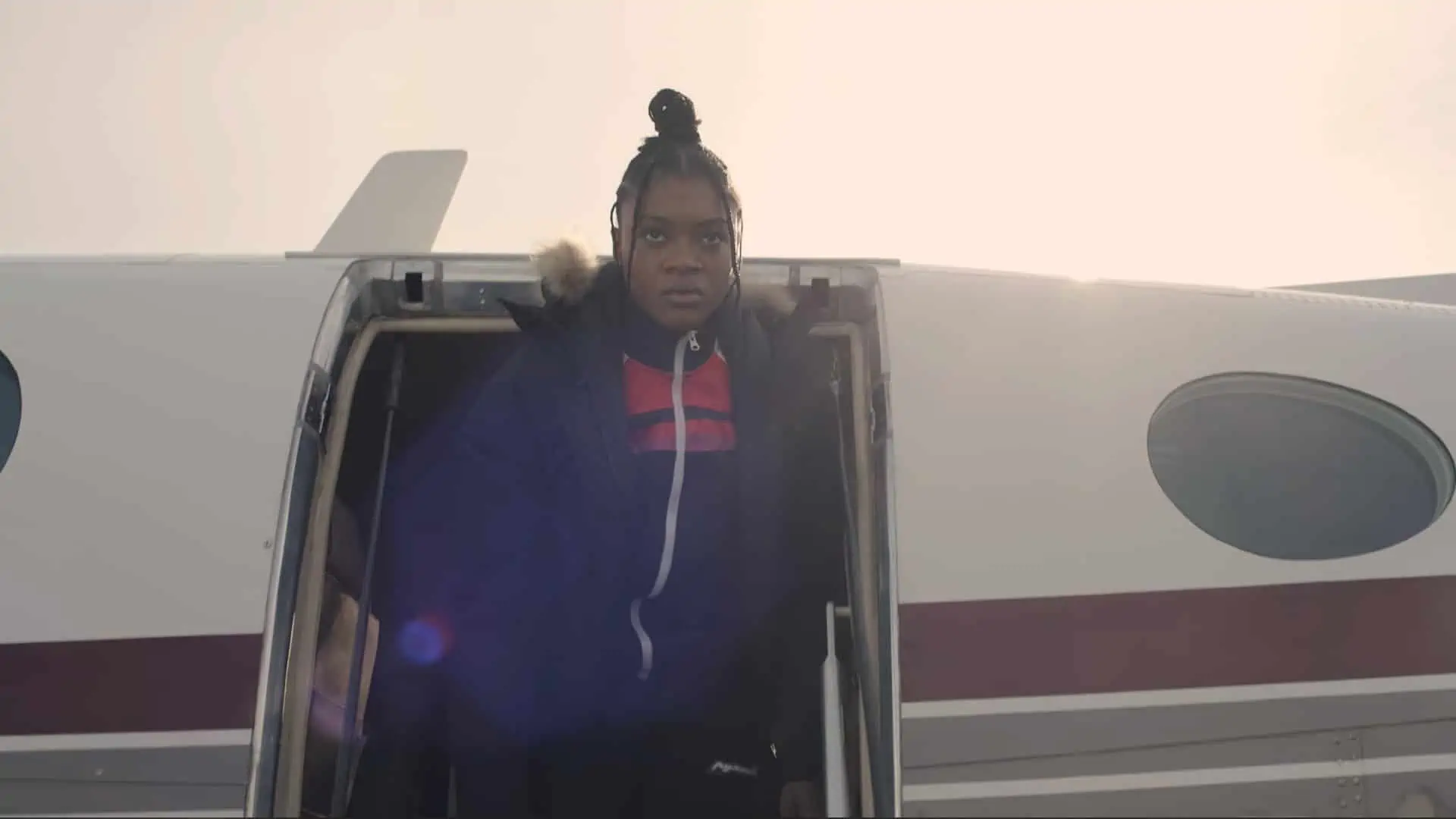 Cheyenne stepping off a plane