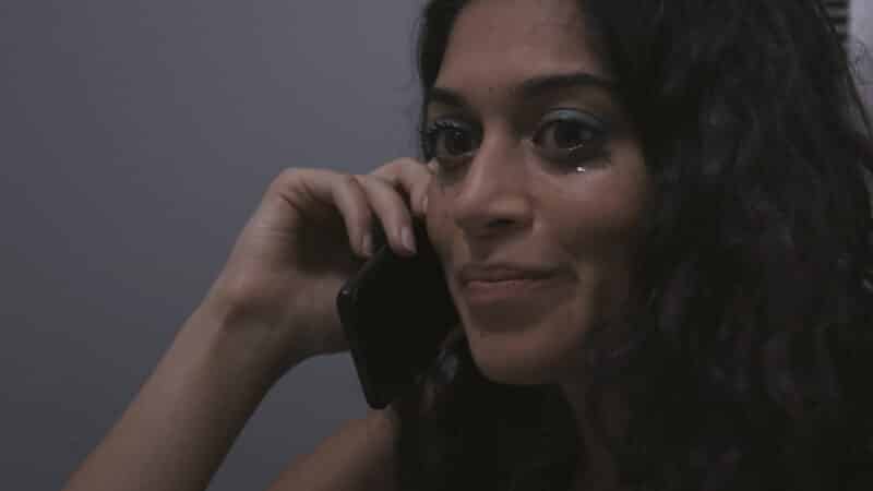 Leila (Jessica Damouni) on the phone