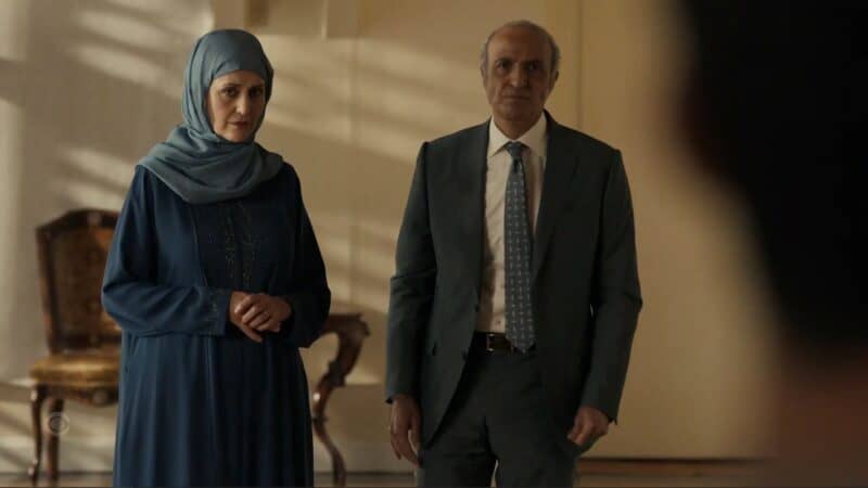 Nora (Jacqueline Antaramian) and Hasan (Nasser Faris) saying goodbye to their son