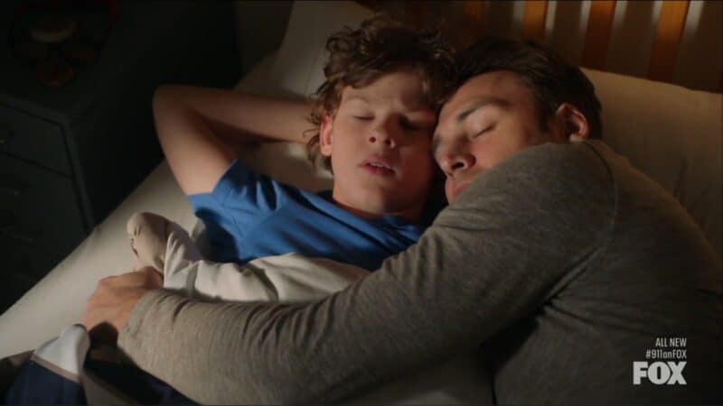 Christopher and Eddie snuggling