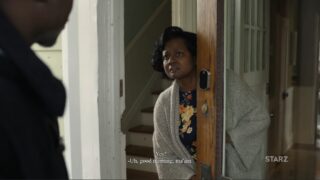Ruth (Elizabeth June) answering her door