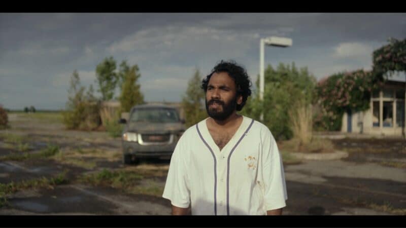 Sayid (Andy McQueen) talking to Kirsten