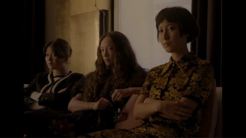 Edith, Mary, and Dora (Emily May Jampel) sitting together