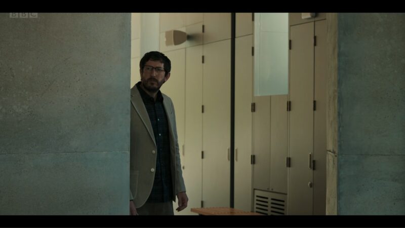 Peter (Ben Addis) looking around a corner in episode 3