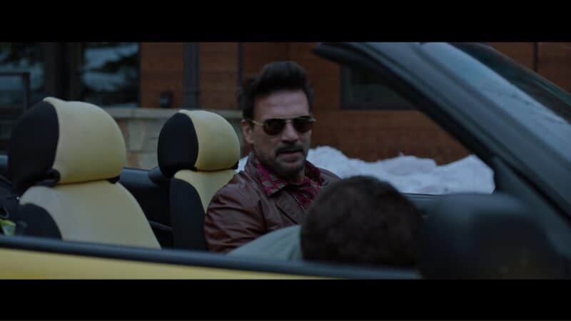 Sebastian (Frank Grillo) in his car, after knocking out Chris