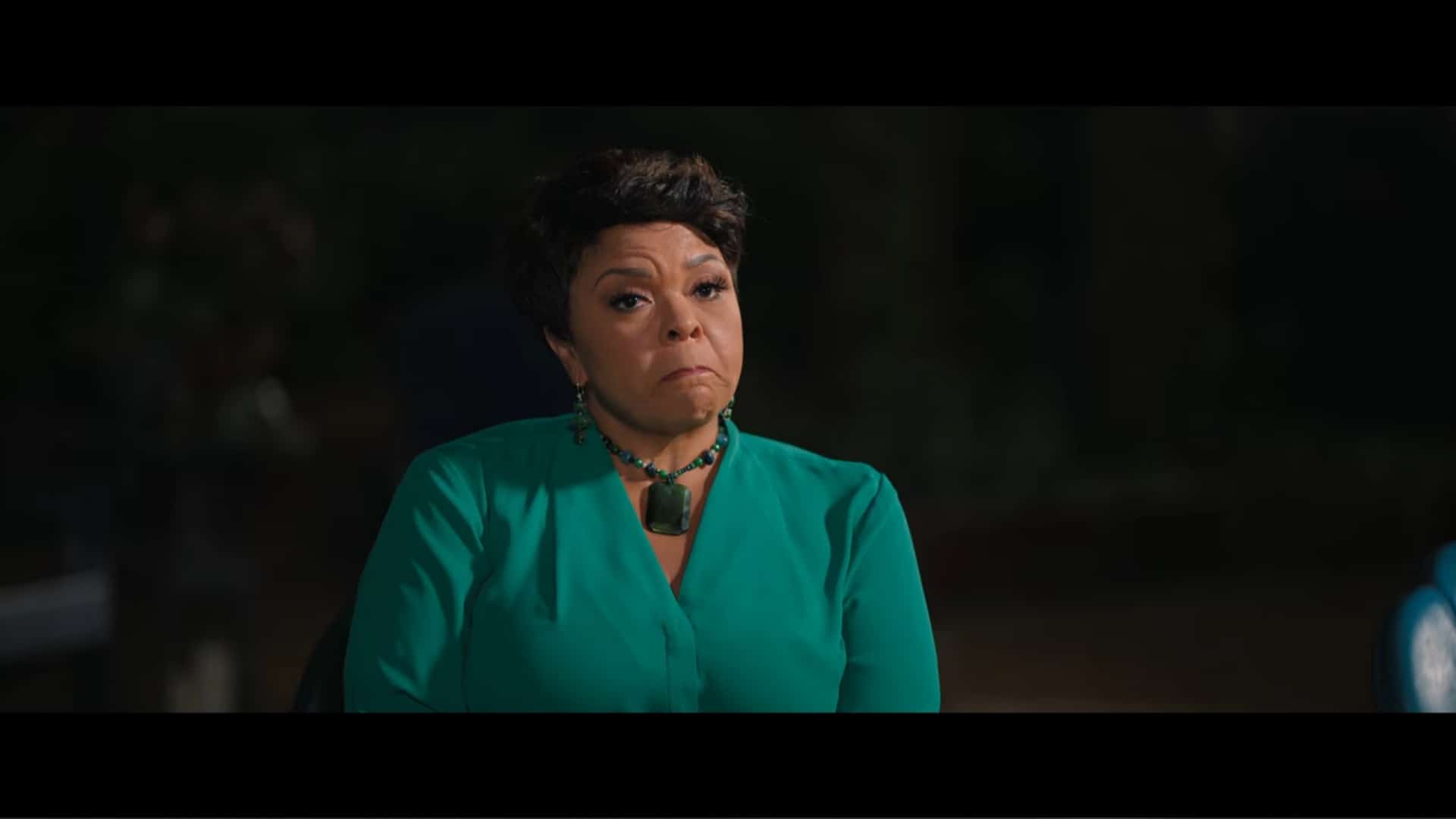 Cora (Tamela Mann) outside at night