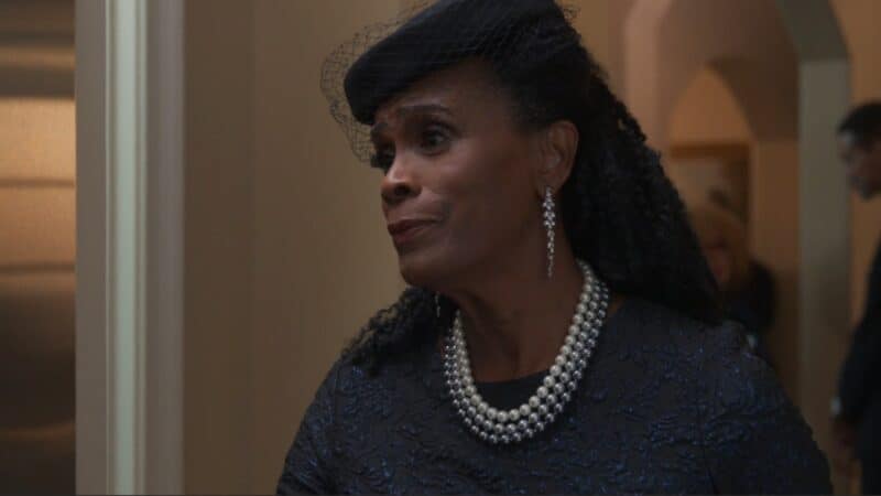 Denise (Janet Hubert) at her husband's funeral