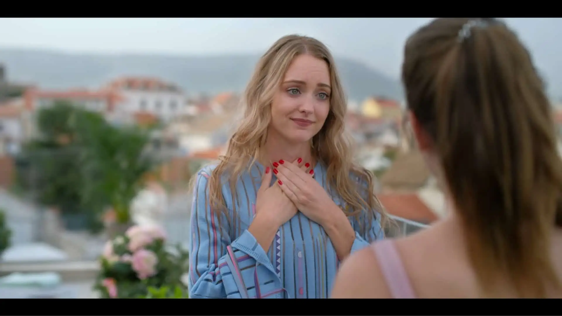 Kate (Christina Wolfe) feeling touched, after Beth gave her a necklace