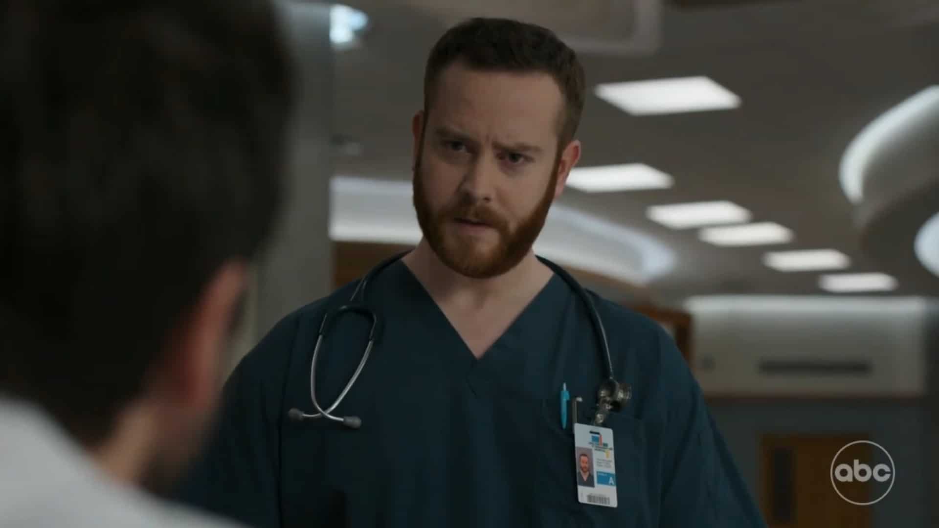 Nurse Martel (Cole Vigue) talking to Asher