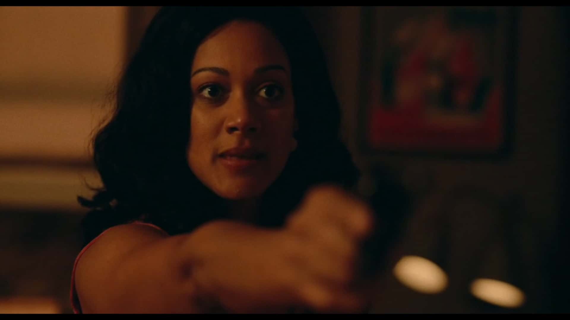 Sensia pointing her gun at Ezra