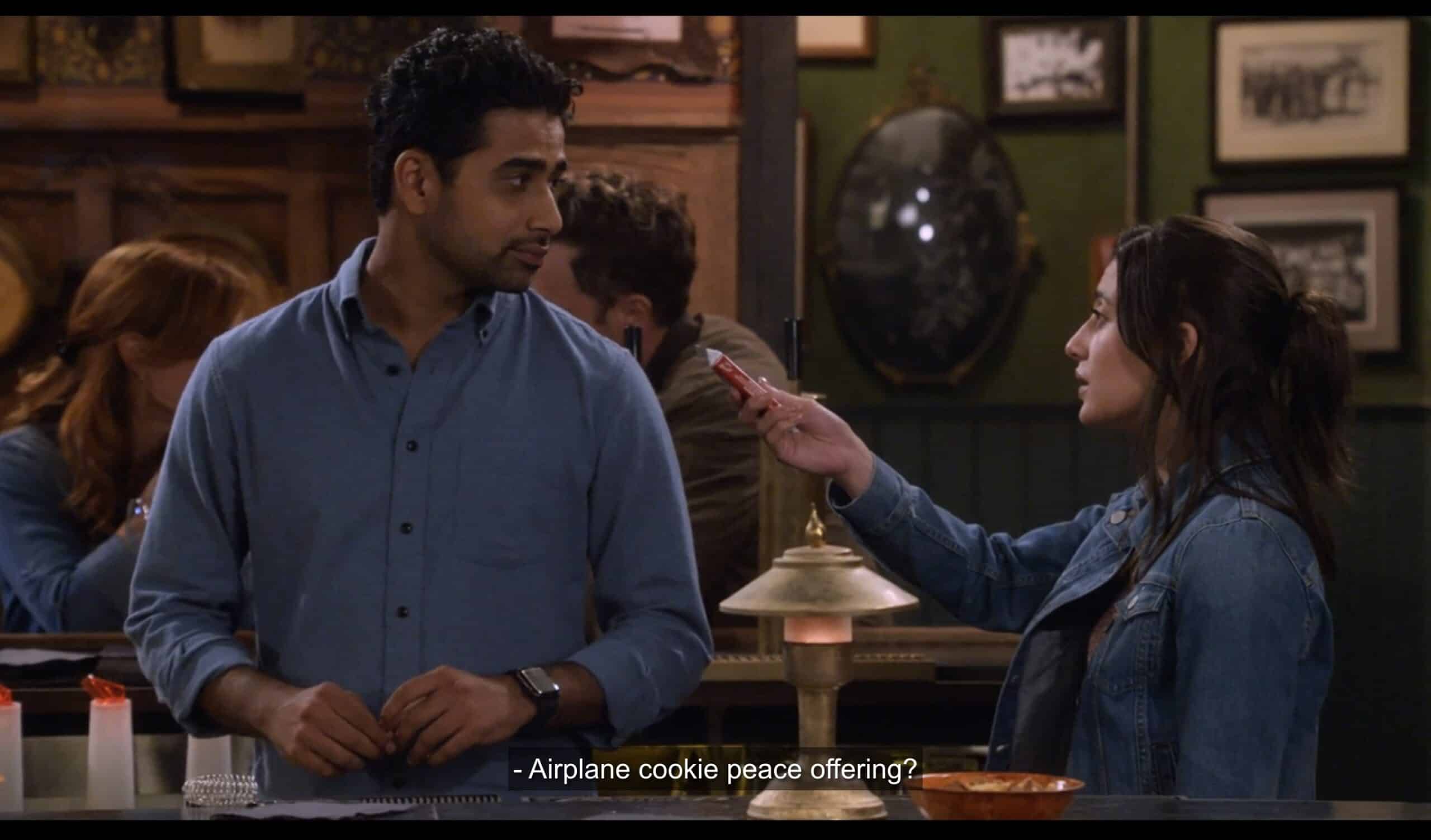 Sid (Suraj Sharma) and Hannah (Ashley Reyes) trying to reconcile