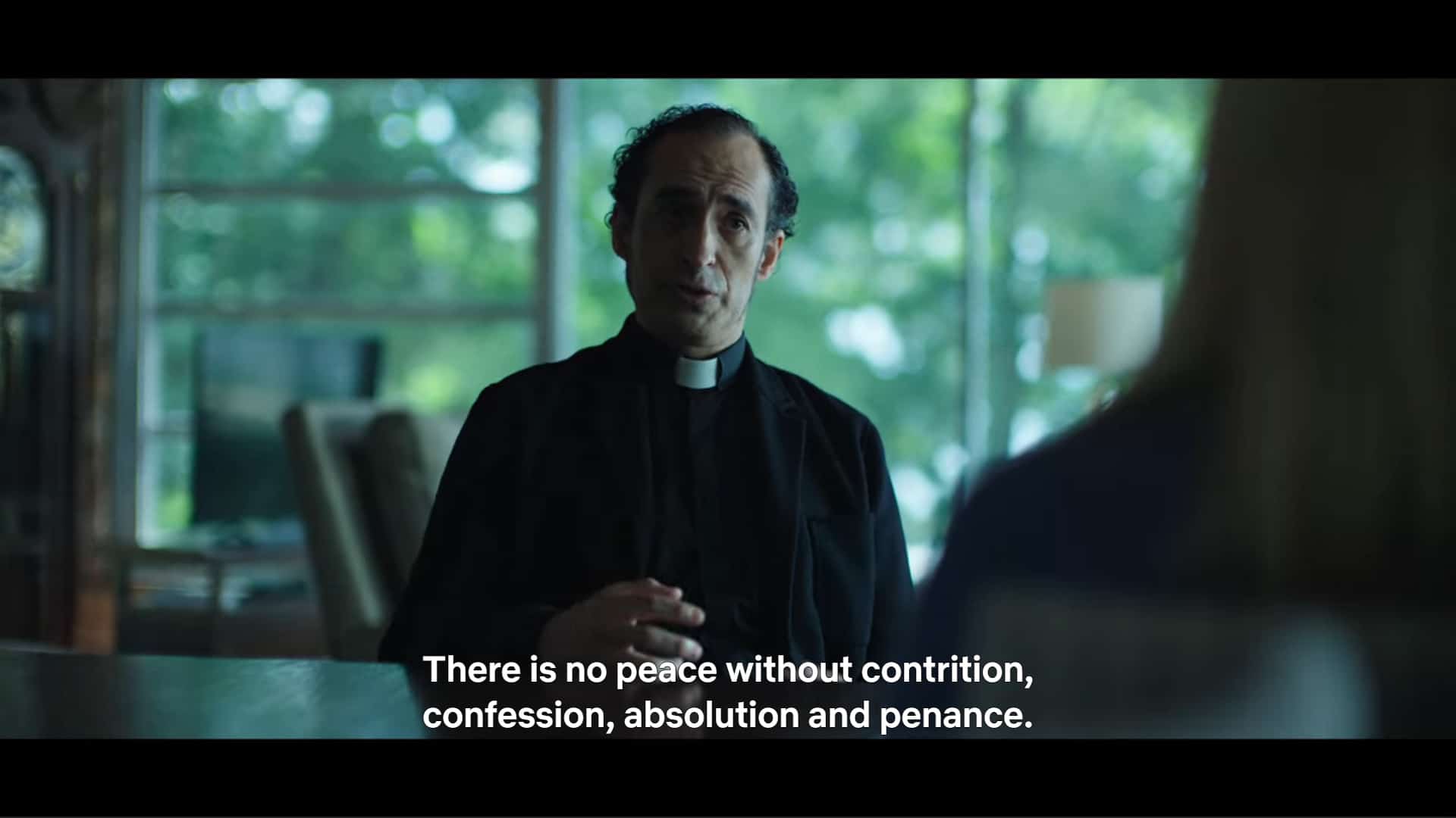 Father Benitez (Bruno Bichir) noting why he thinks Omar should maybe stay in prison