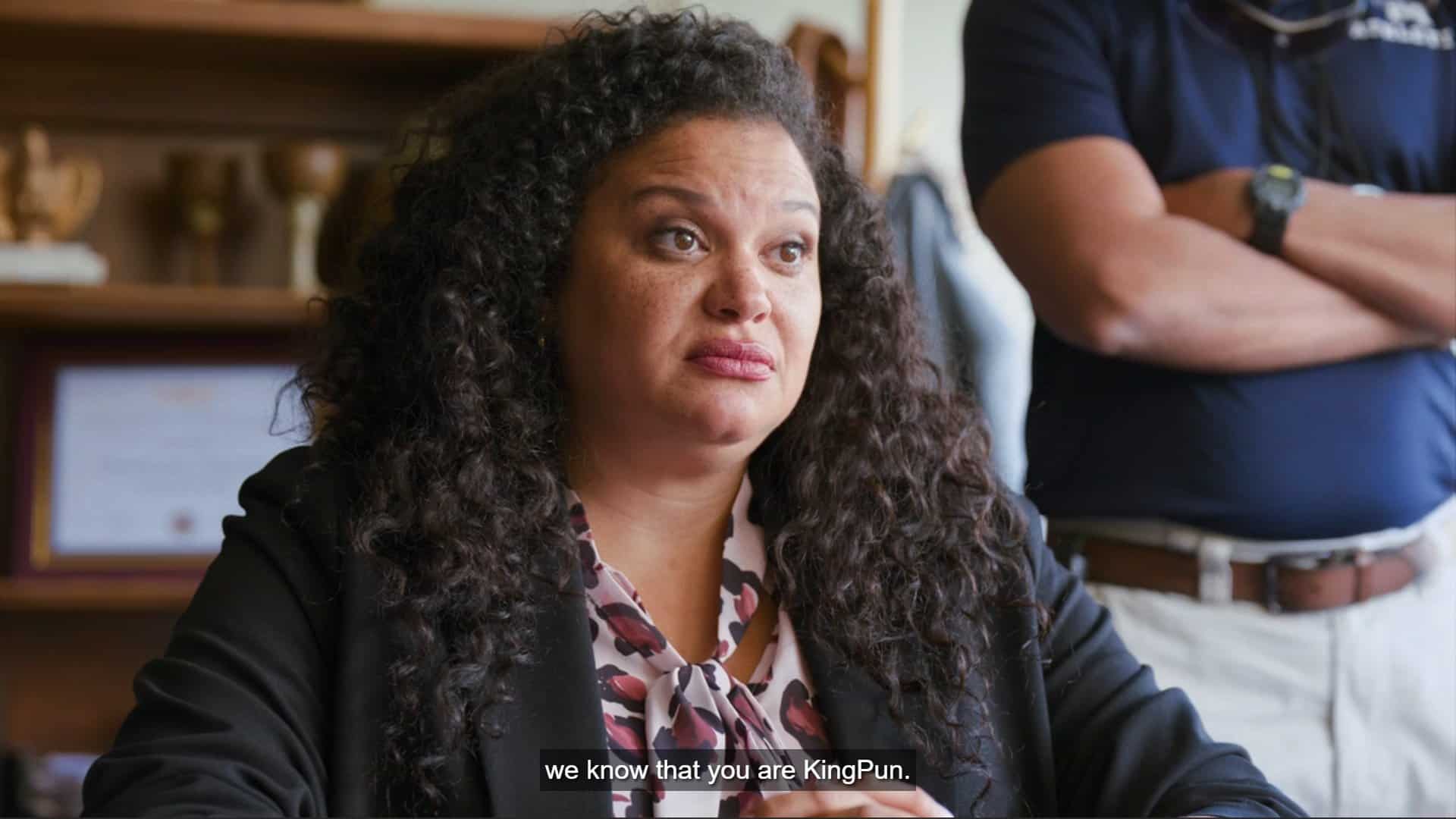 Principal Collins (Michelle Buteau) saying they know Paige is KingPun
