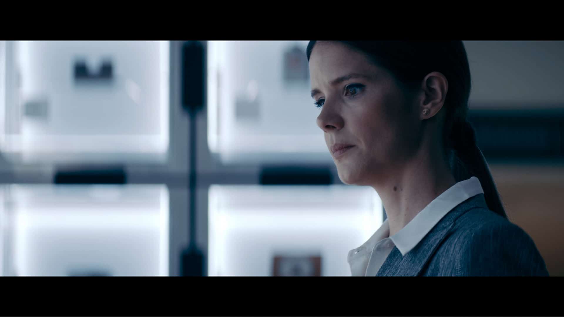 Edie (Sonya Cassidy) contemplating her brother being fired