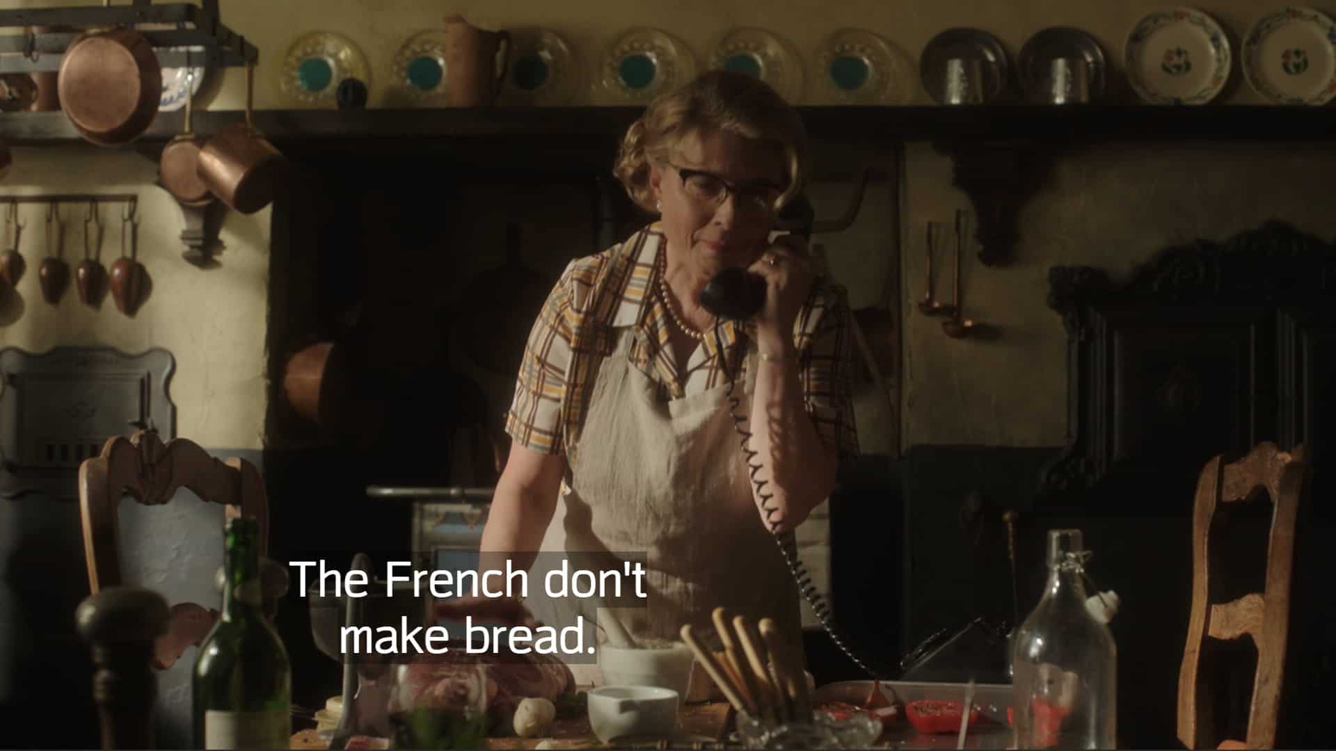 Simca (Isabella Rossellini)  questioning Julia wanting to include bread in their cook book
