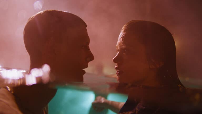 Jamie (Patrick Gibson) and Jane (Rain Spencer) in a pool together
