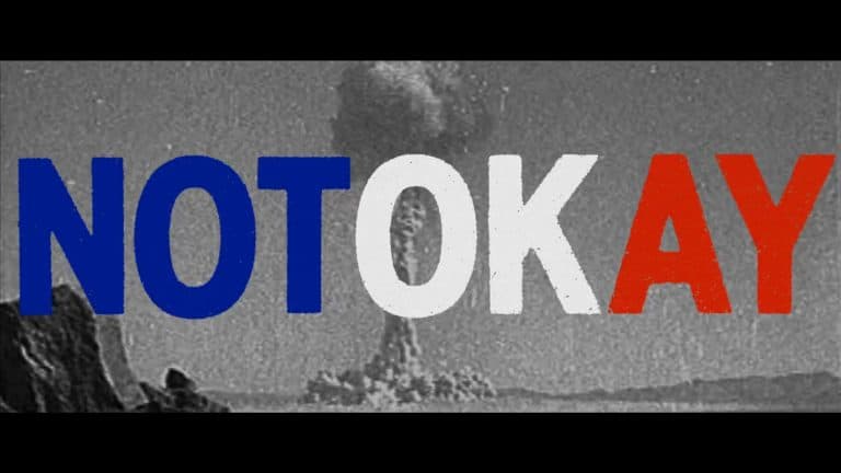 Title Card for Not Okay featuring an explosion