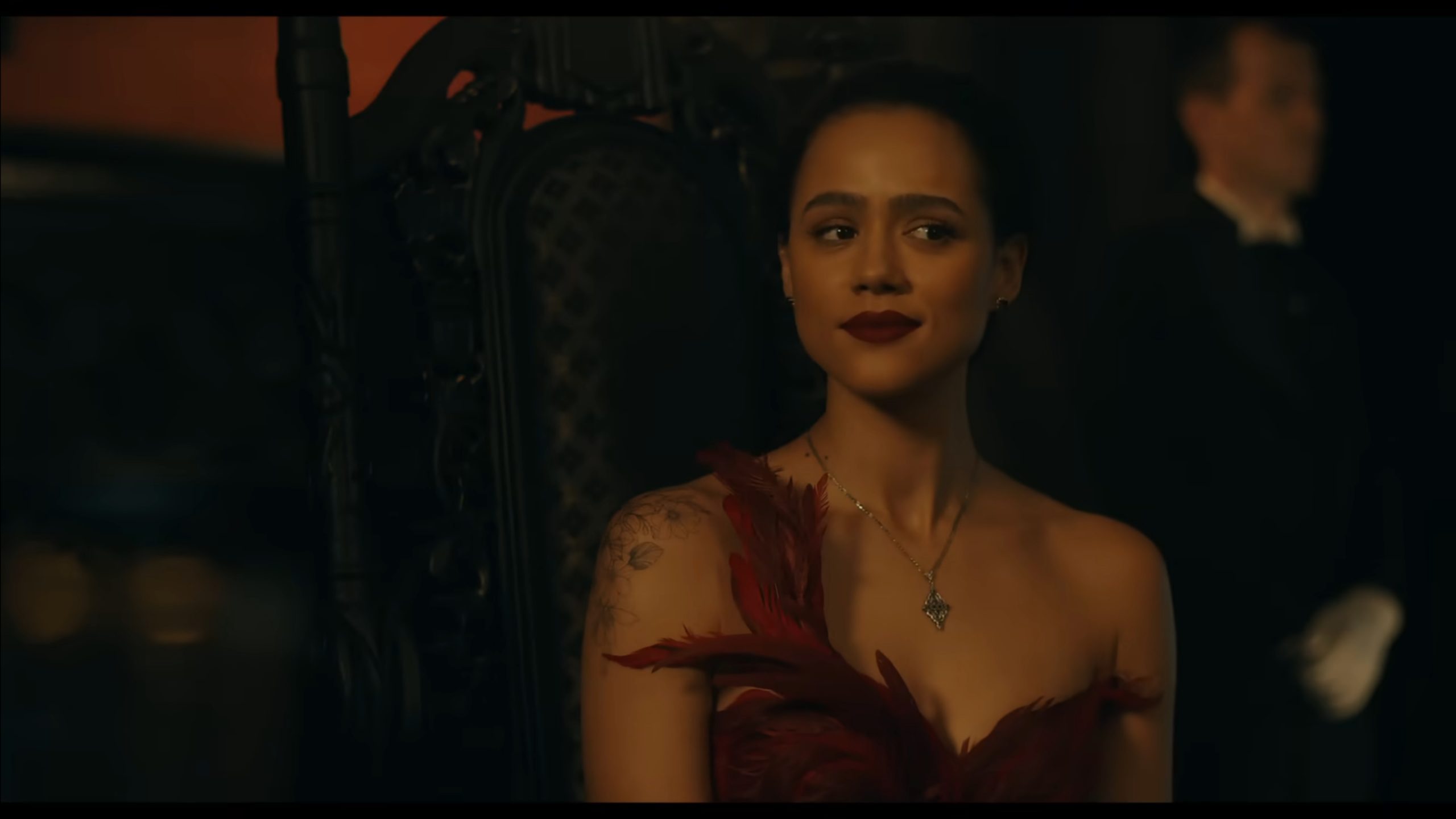 Evie (Nathalie Emmanuel) wearing a dress Walter picked out for her