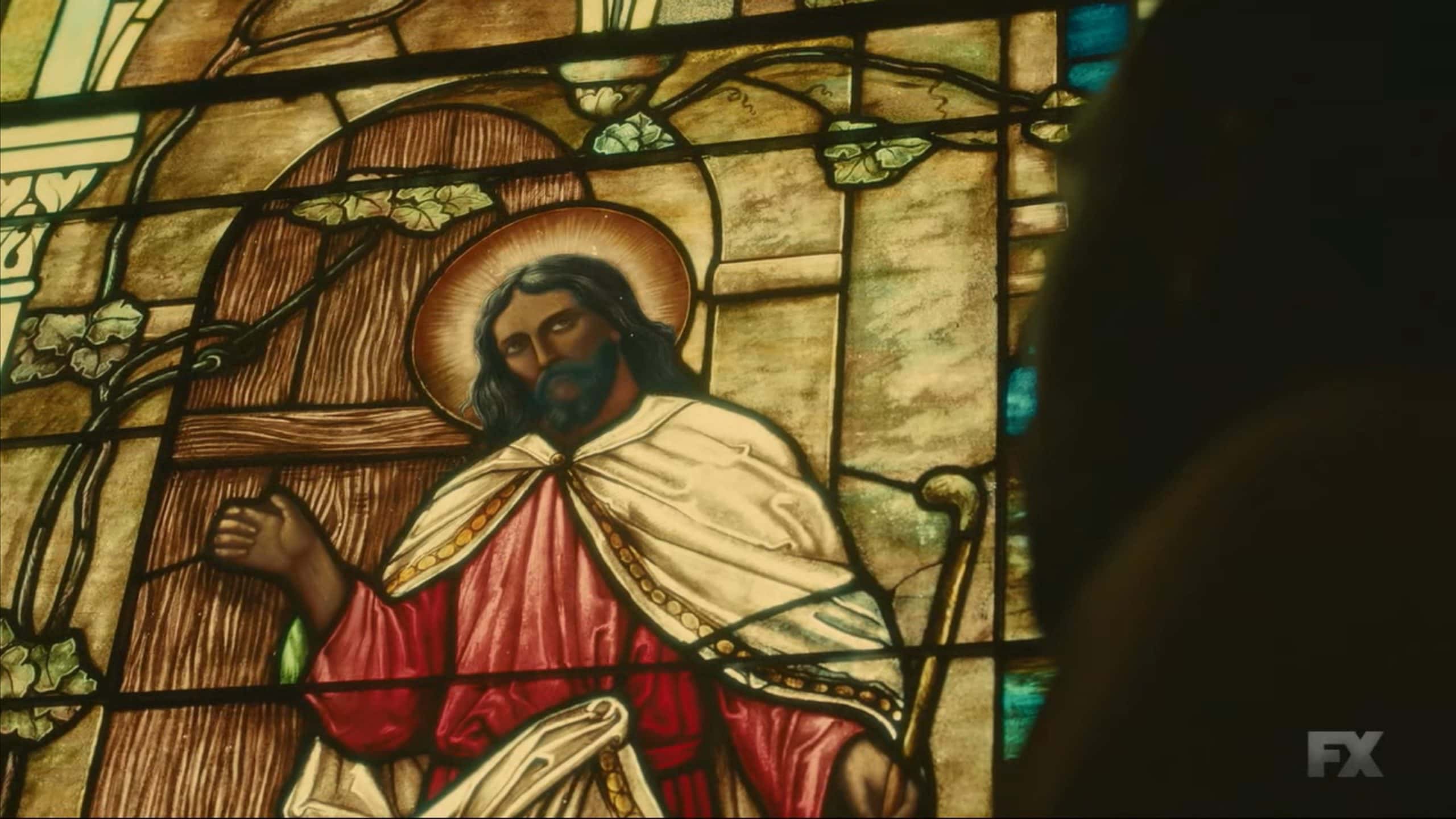 Black Jesus in a stain glass window