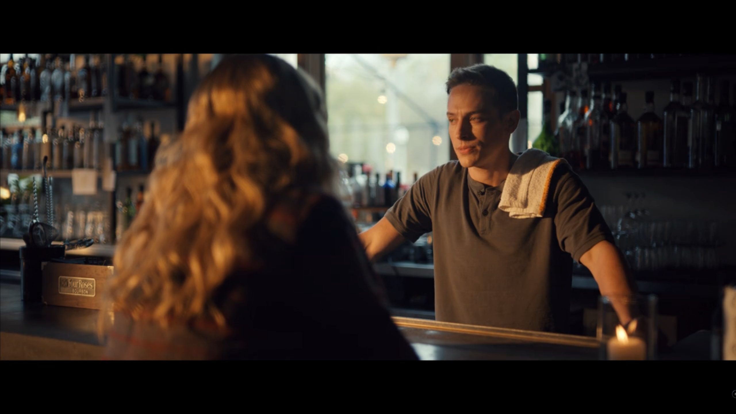 Max (Edmund Donovan) at his family's bar talking to Lucy