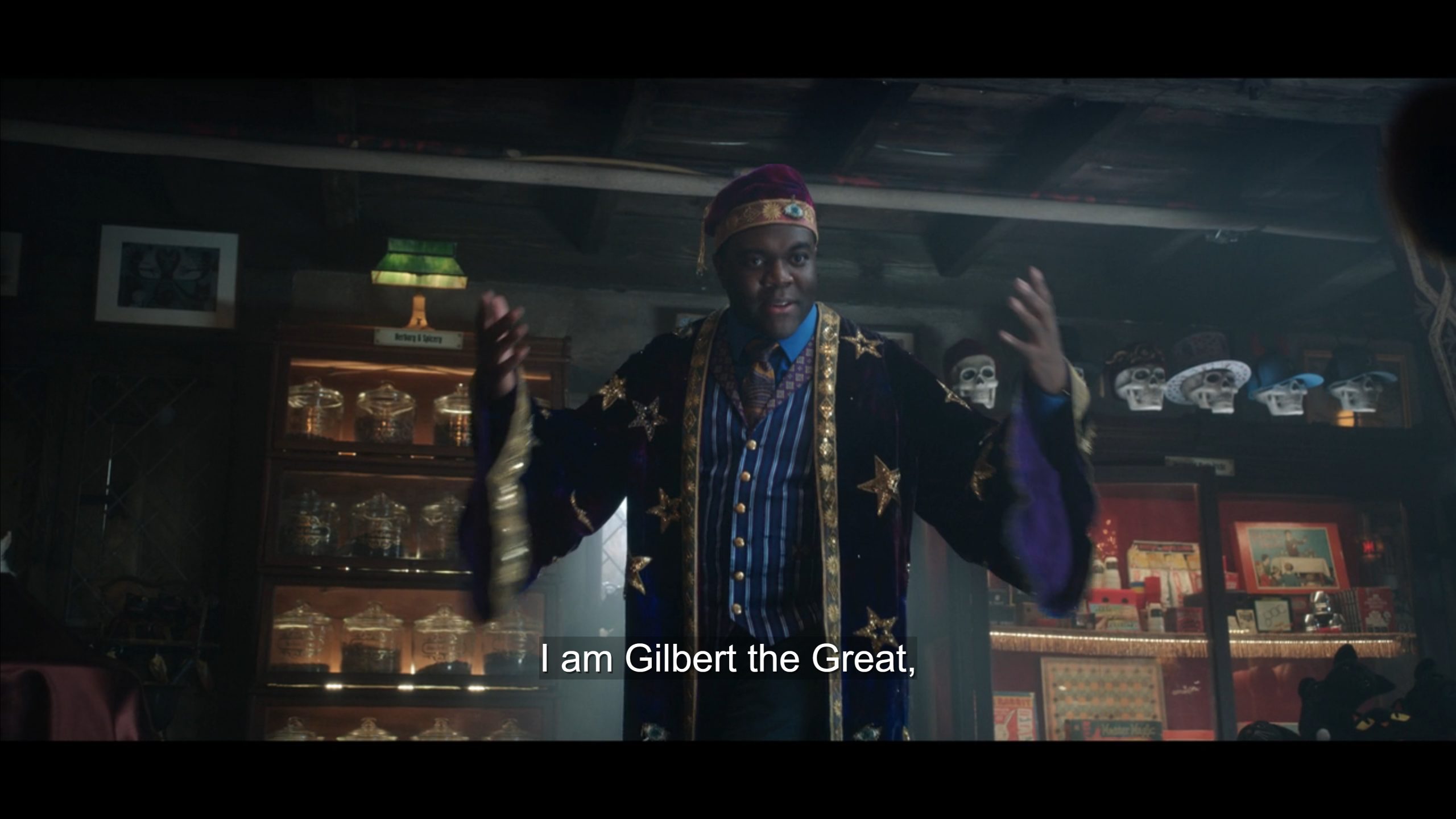 Gilbert (Sam Richardson) performing for a crowd in his store