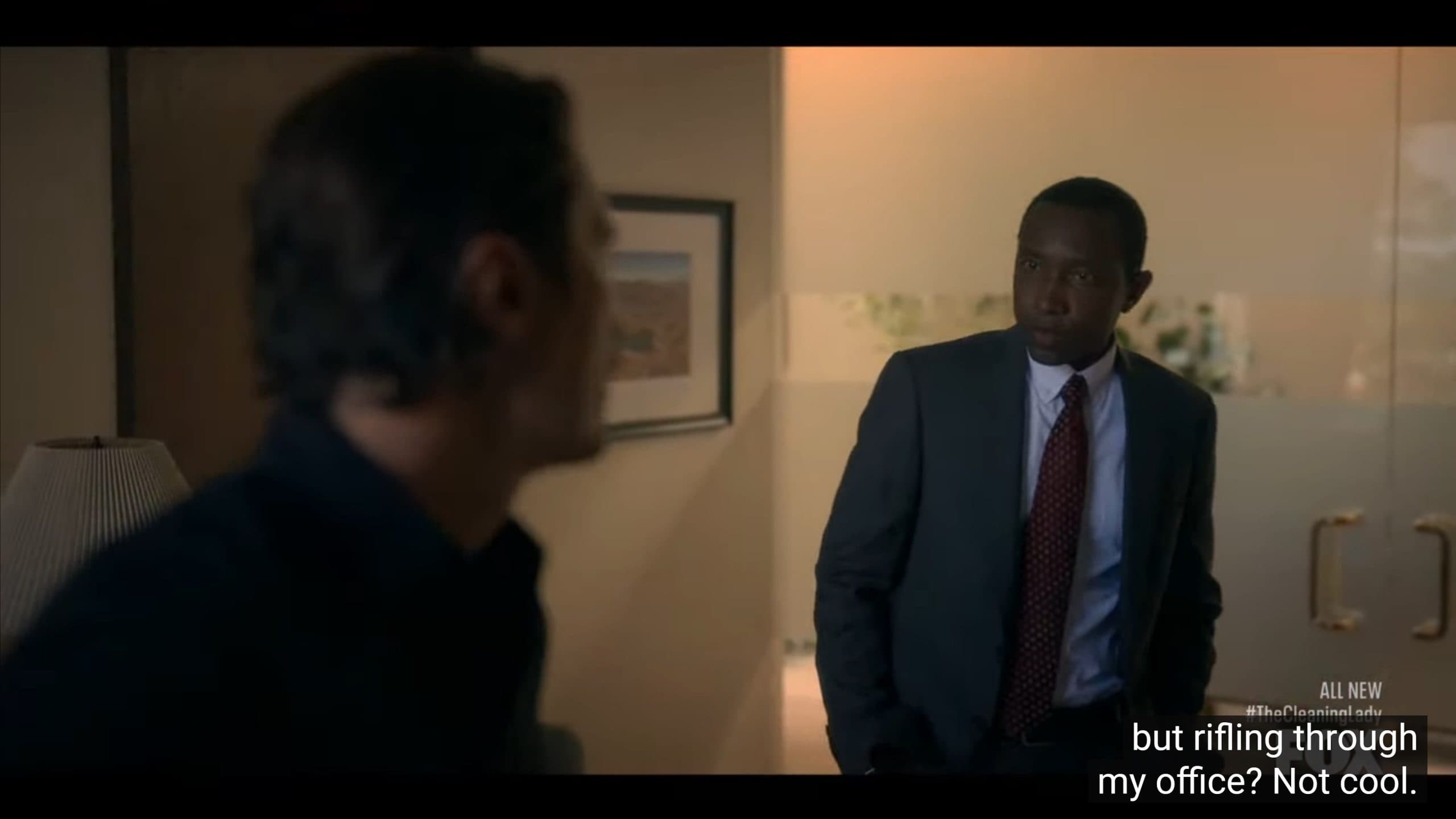 Tyler Jefferson (K.C. Collins) upset Garrett is rummaging through his office