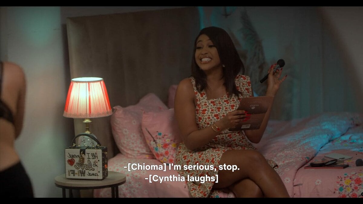 Cynthia (Uche Nwaefuna) teasing Chioma as she gets ready for her date with Nonso