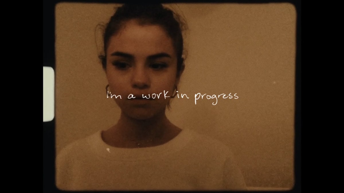 Selena Gomez with the words 'I'm a work in progress.'