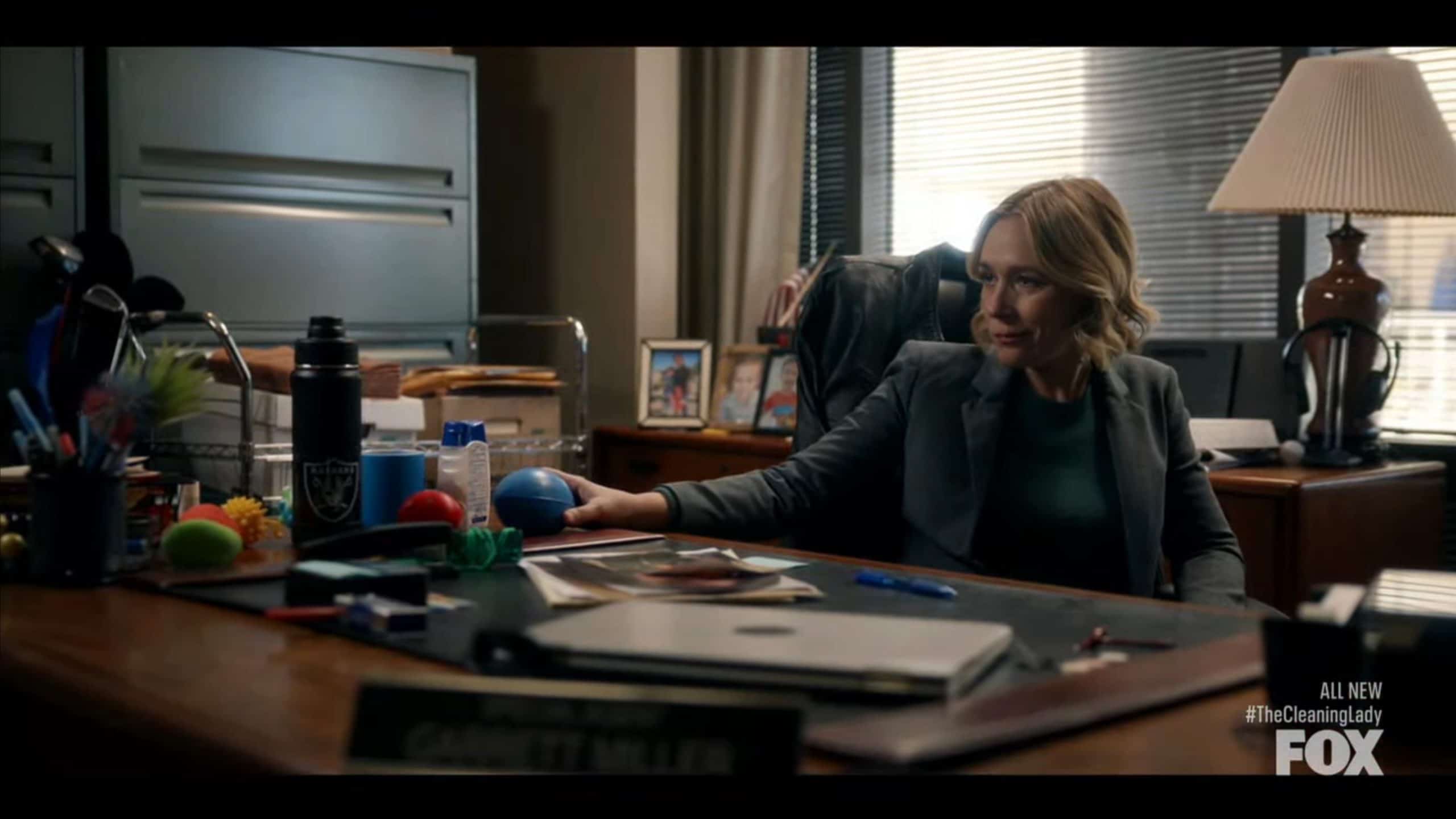 Agent Russo at Garrett's desk