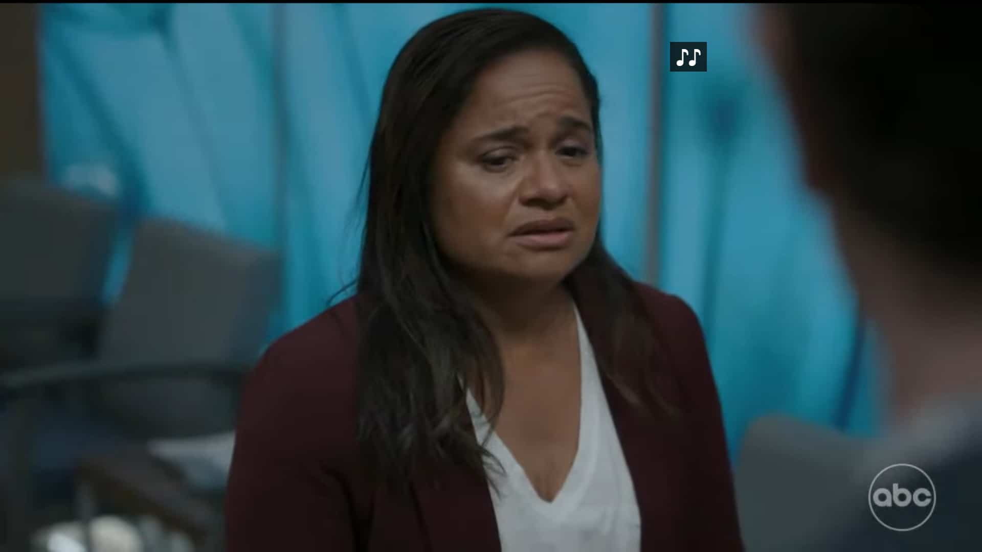 Luna (Tracy Vilar) crying over the decision she has to make regarding Naveen's care