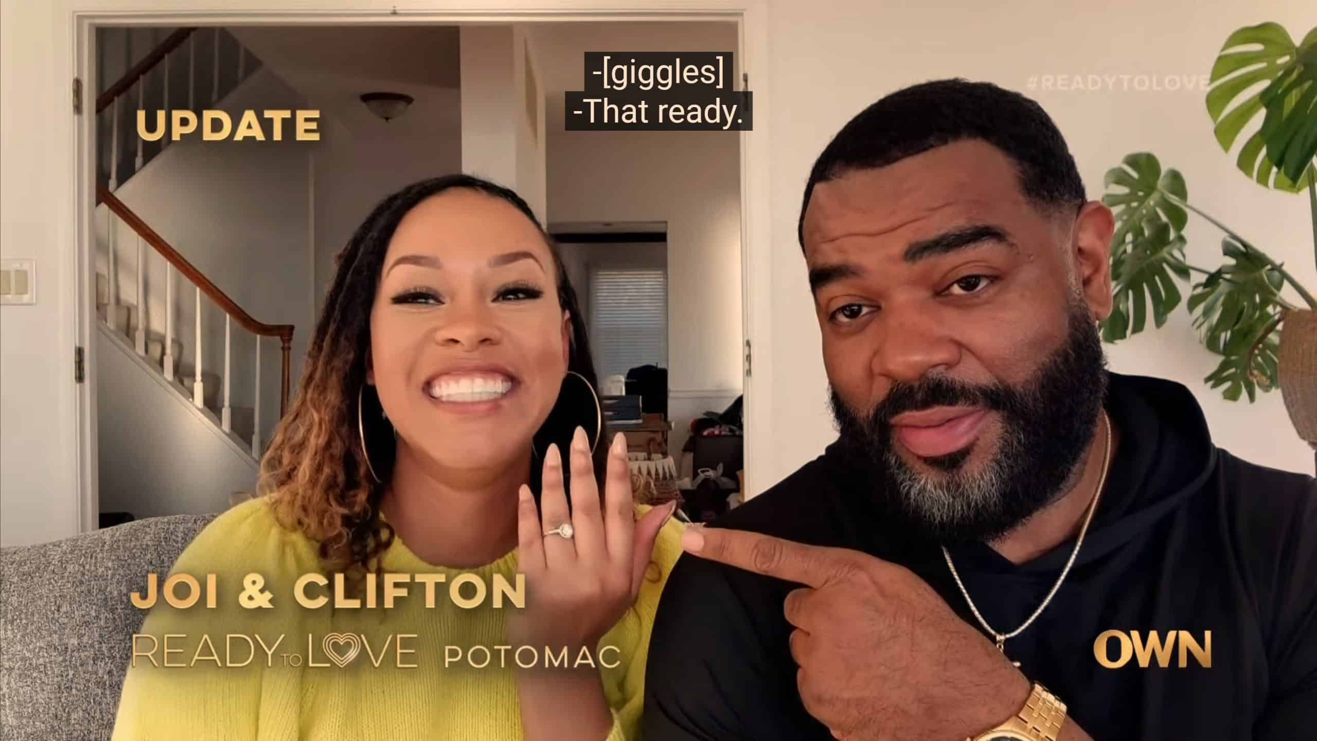 Clifton pointing to Joi's engagement ring
