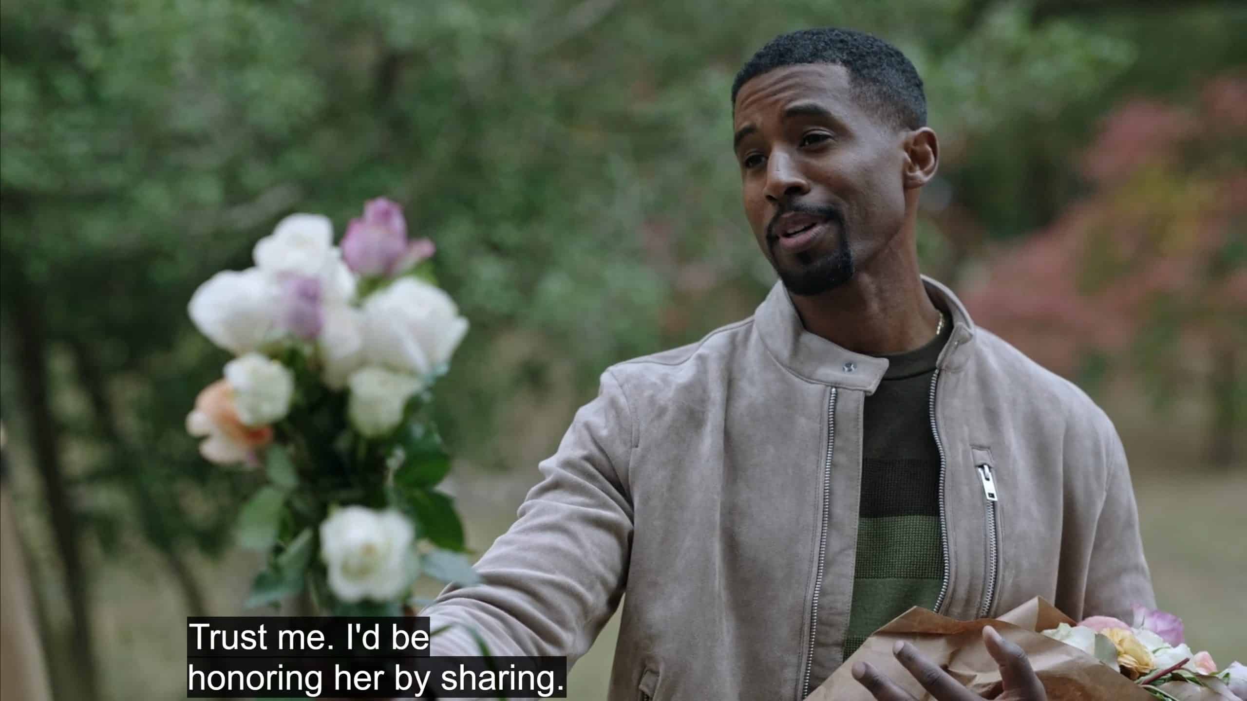 Osiris (Gavin Houston) offering flowers for Isis' mother's grave