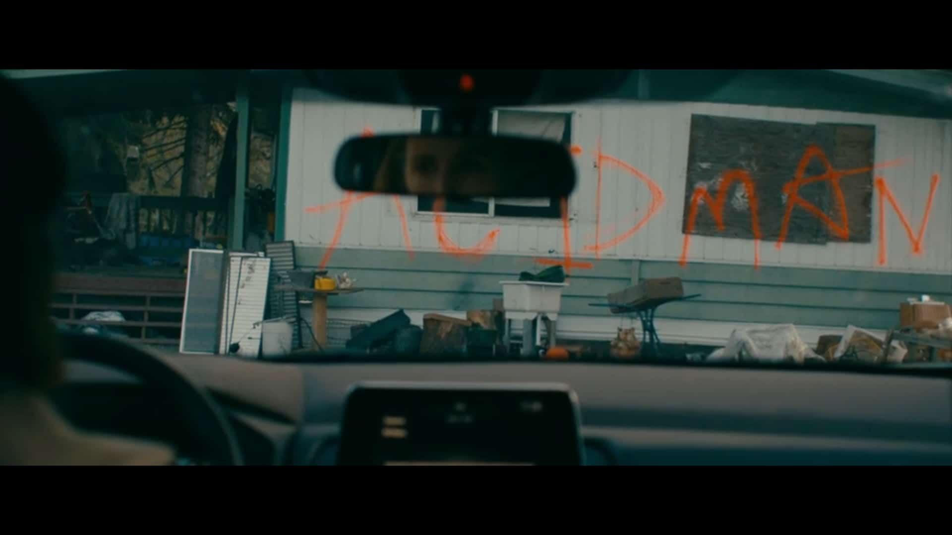 Graffiti on Lloyd's trailer calling him 'Acidman,'