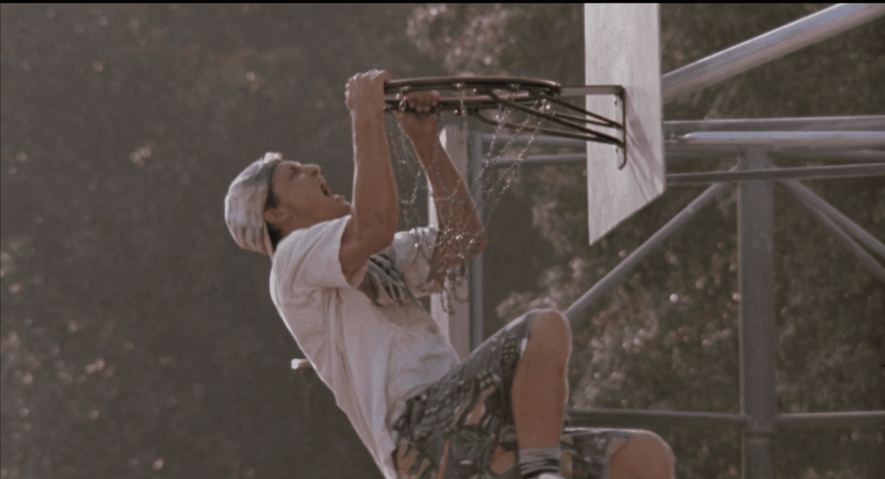"Billy Doyle (Woody Harrelson)" dunking in the end tournament proving that White men can, in fact, dunk, White Men Can’t Jump, directed by Ron Shelton, 1989 (Hulu, LLC)