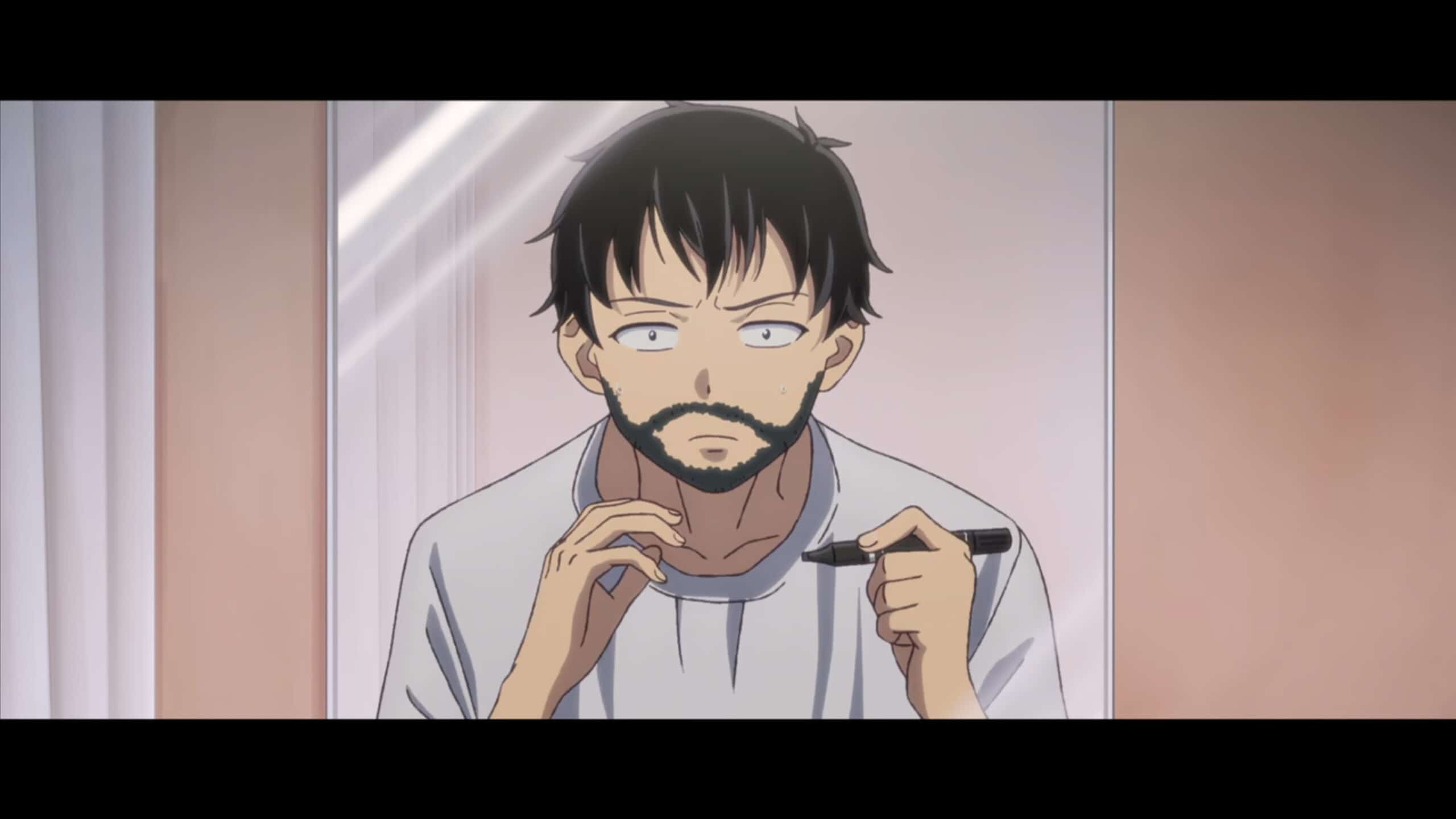 Akira (Shuichiro Umeda) drawing on a beard and mustache