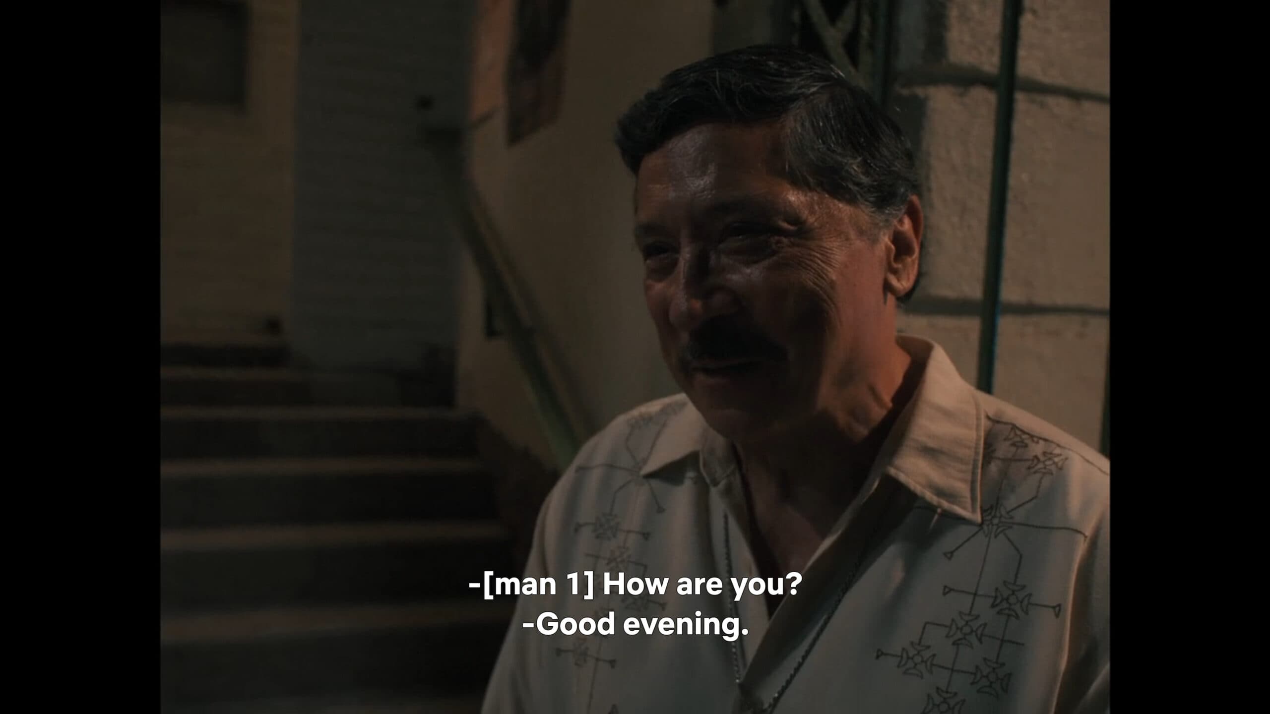 Pastor Cruz (Carlos Bardem) greeting people