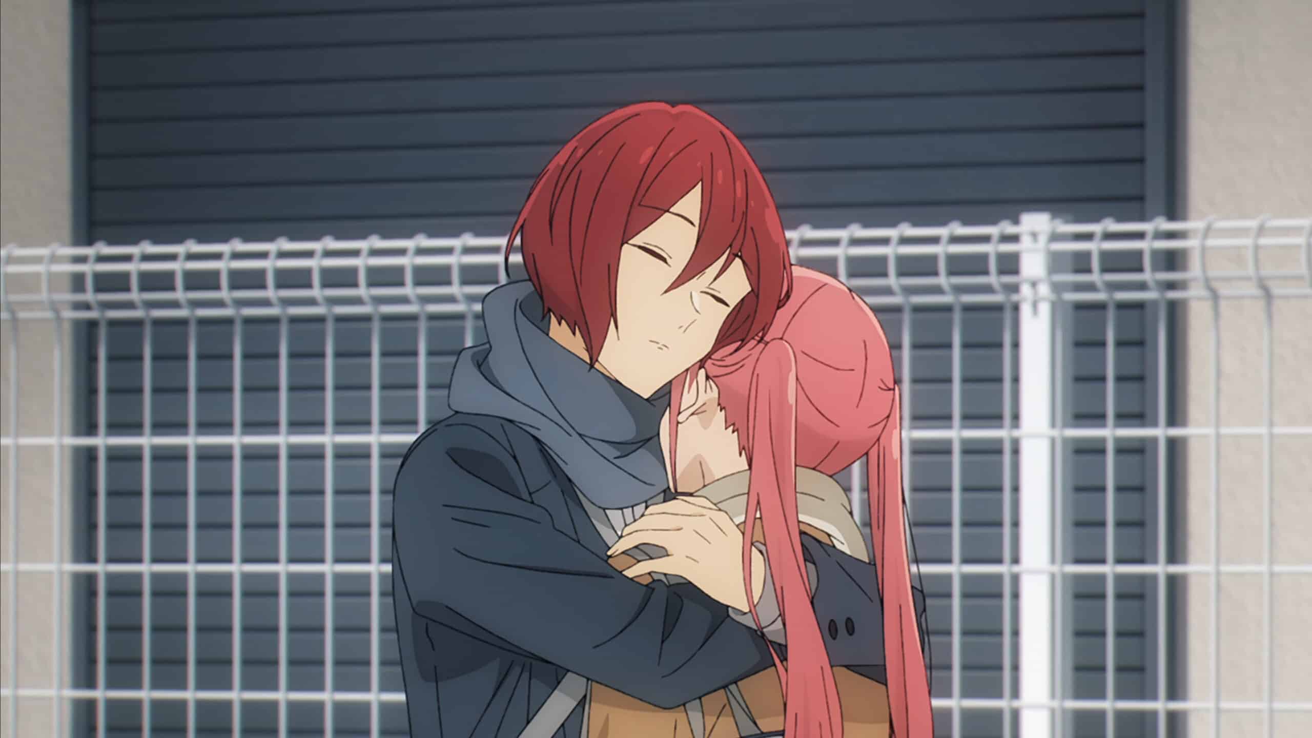 Sengoku (Nobuhiko Okamoto) and Remi (M-A-O) hugging