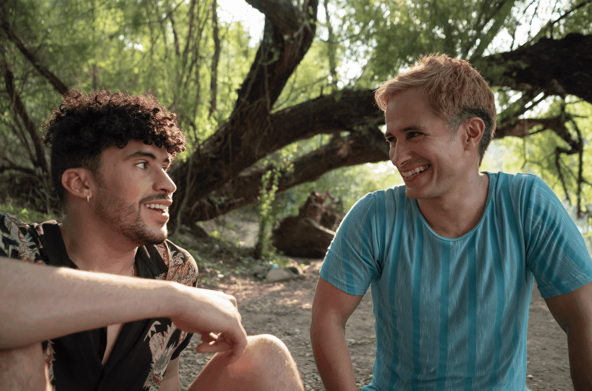 Felipe (Bad Bunny) and Saul (Gael Garcia Bernal) talking