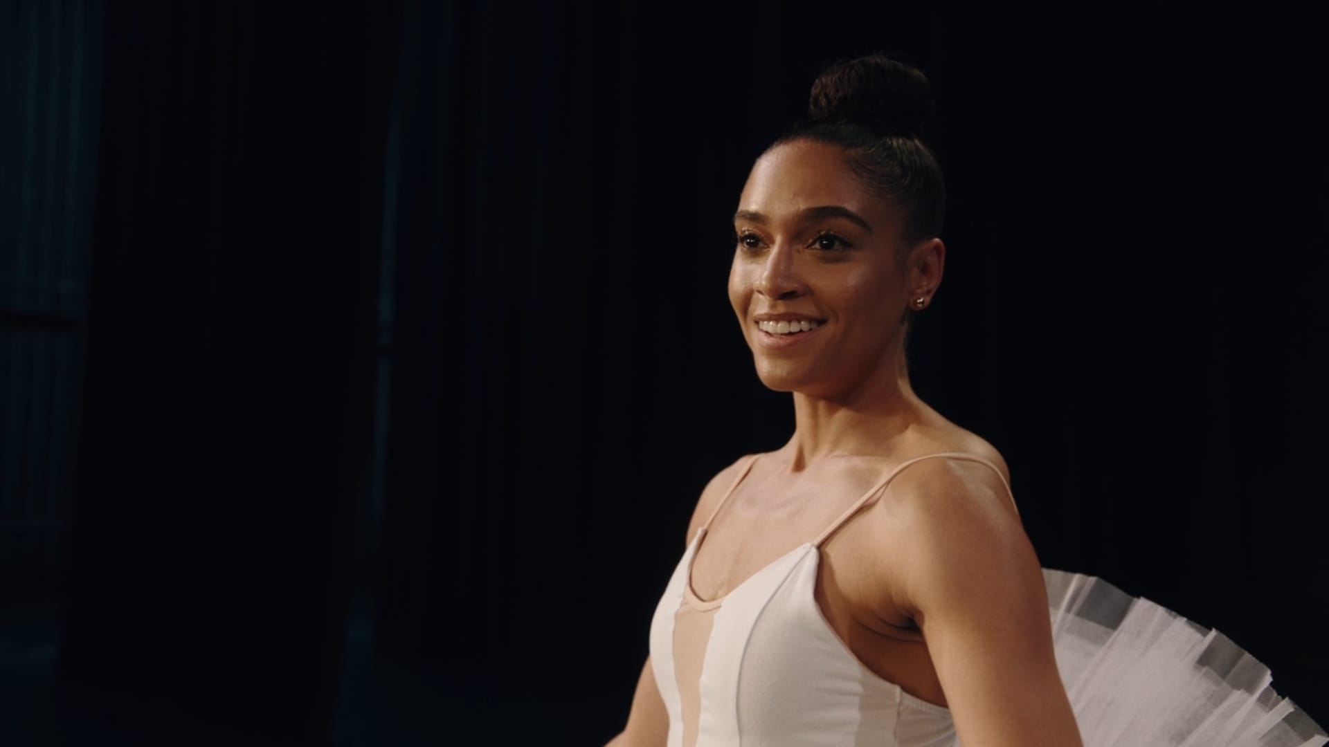 Nadia (Kyle Kankonde) in a proper leotard