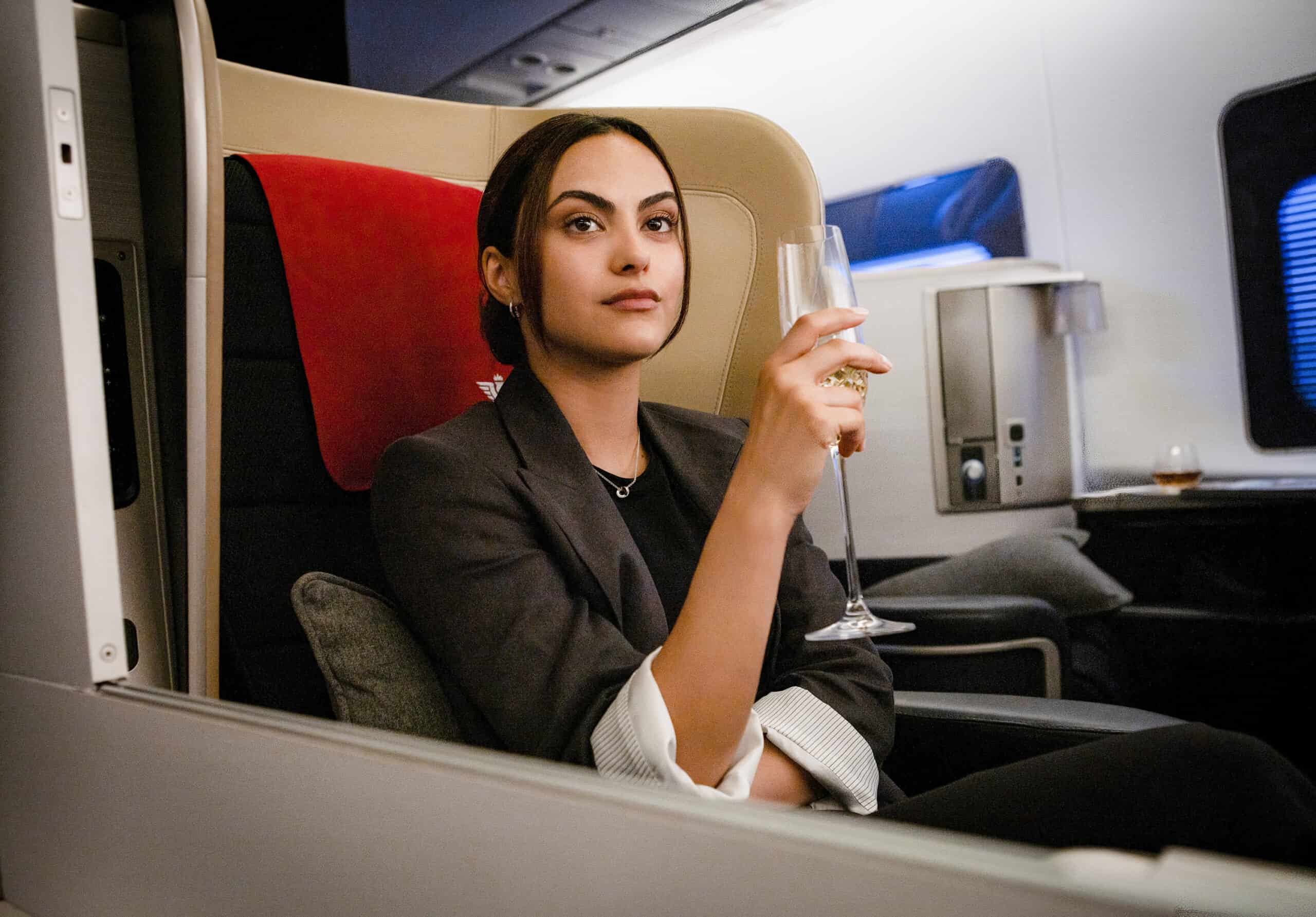 Ana (Camila Mendes) in first class