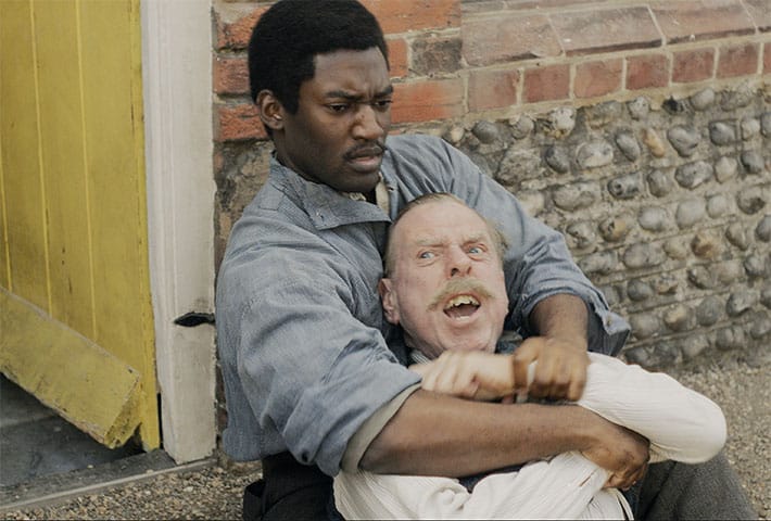 Malachi Kirby as Bill and Timothy Spall as Edward fighting