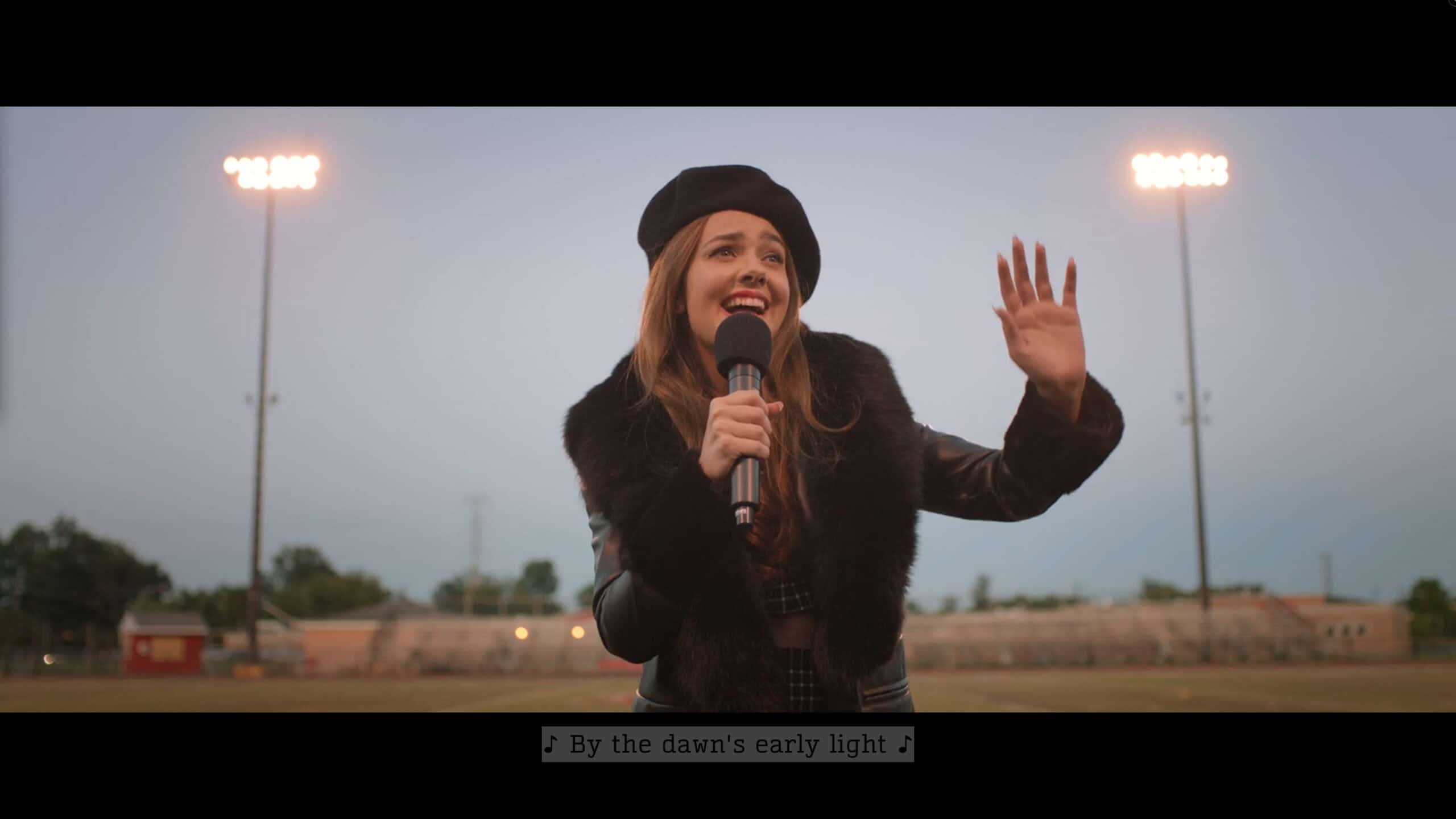 Claire performing the national anthem